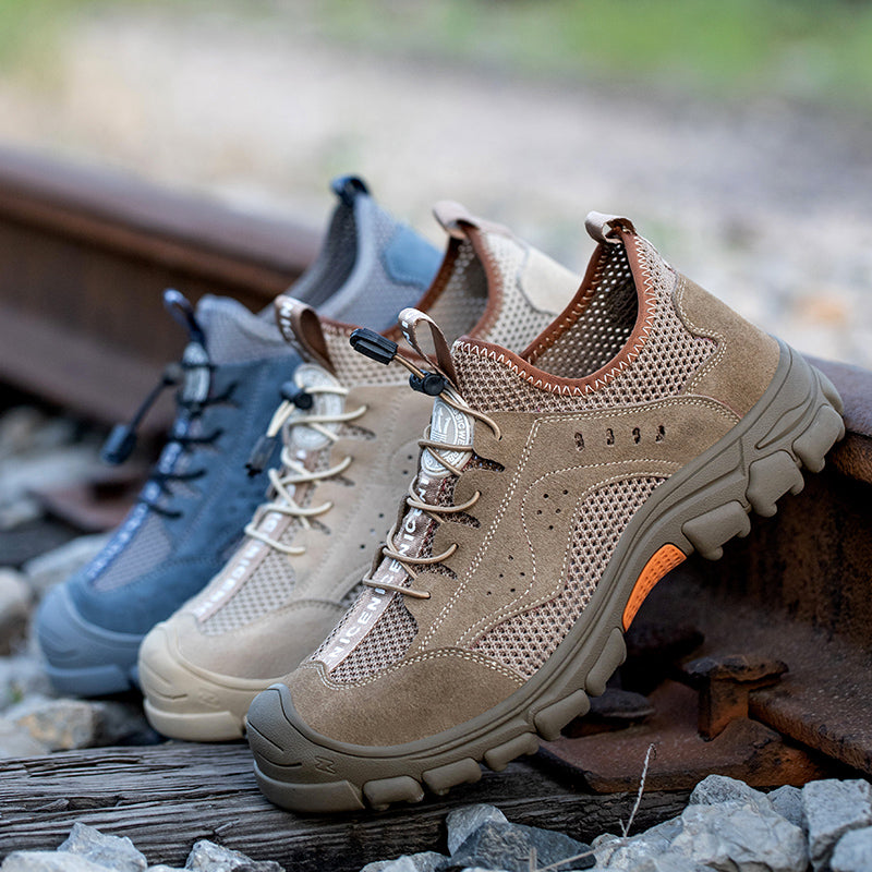 Schritttest: Sicherheitsschuh Grau-Orange auf Schotter, stoßdämpfend