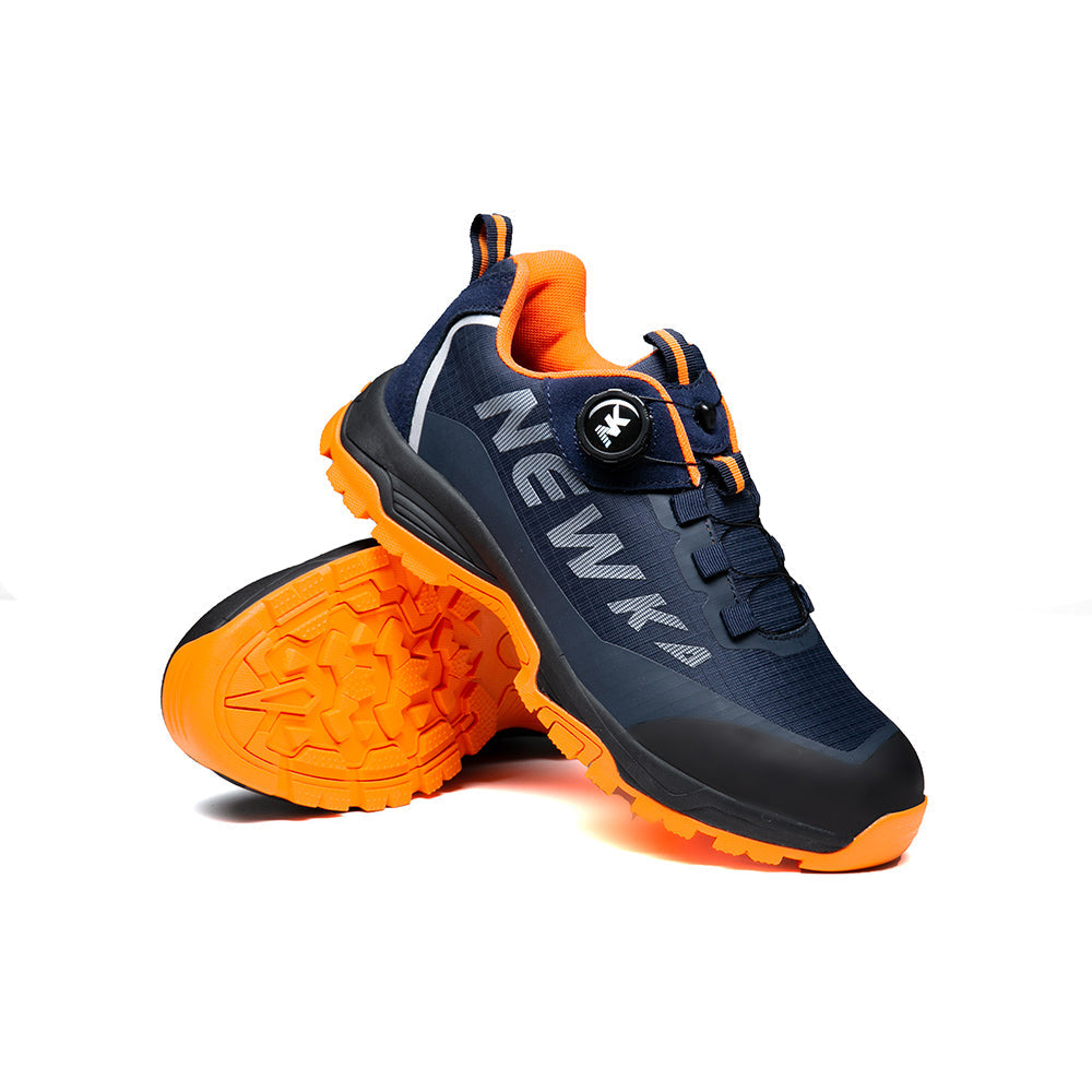 Navy/Orange Schuh liegt auf Seite, Untersohle Orange sichtbar