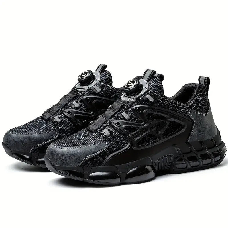 Paar schwarze Arbeitsschuhe nebeneinander, Studio-Seitenansichten