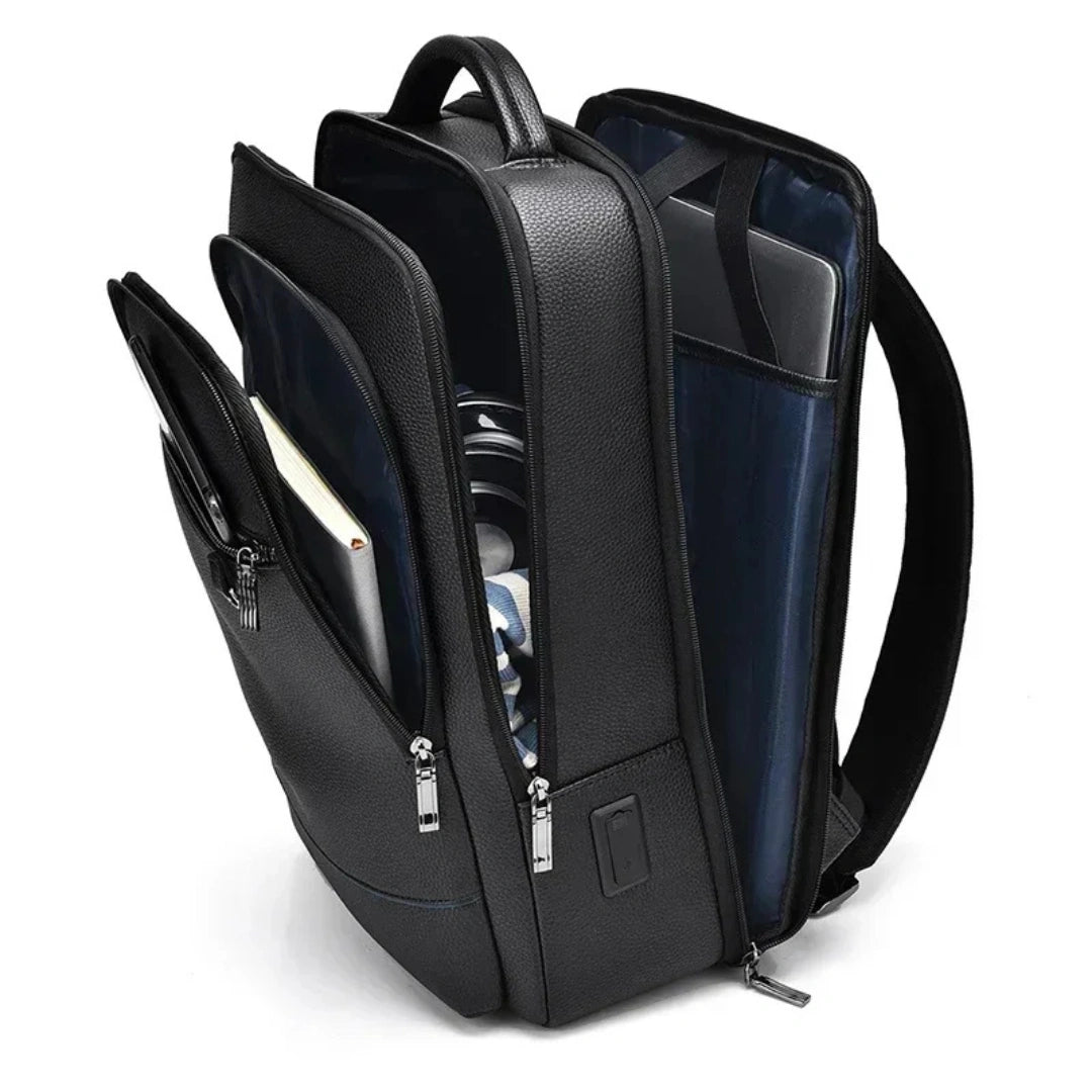 Executive Business‑Rucksack geöffnet – Fächersystem mit Laptop, Tablet und Dokumenten sichtbar