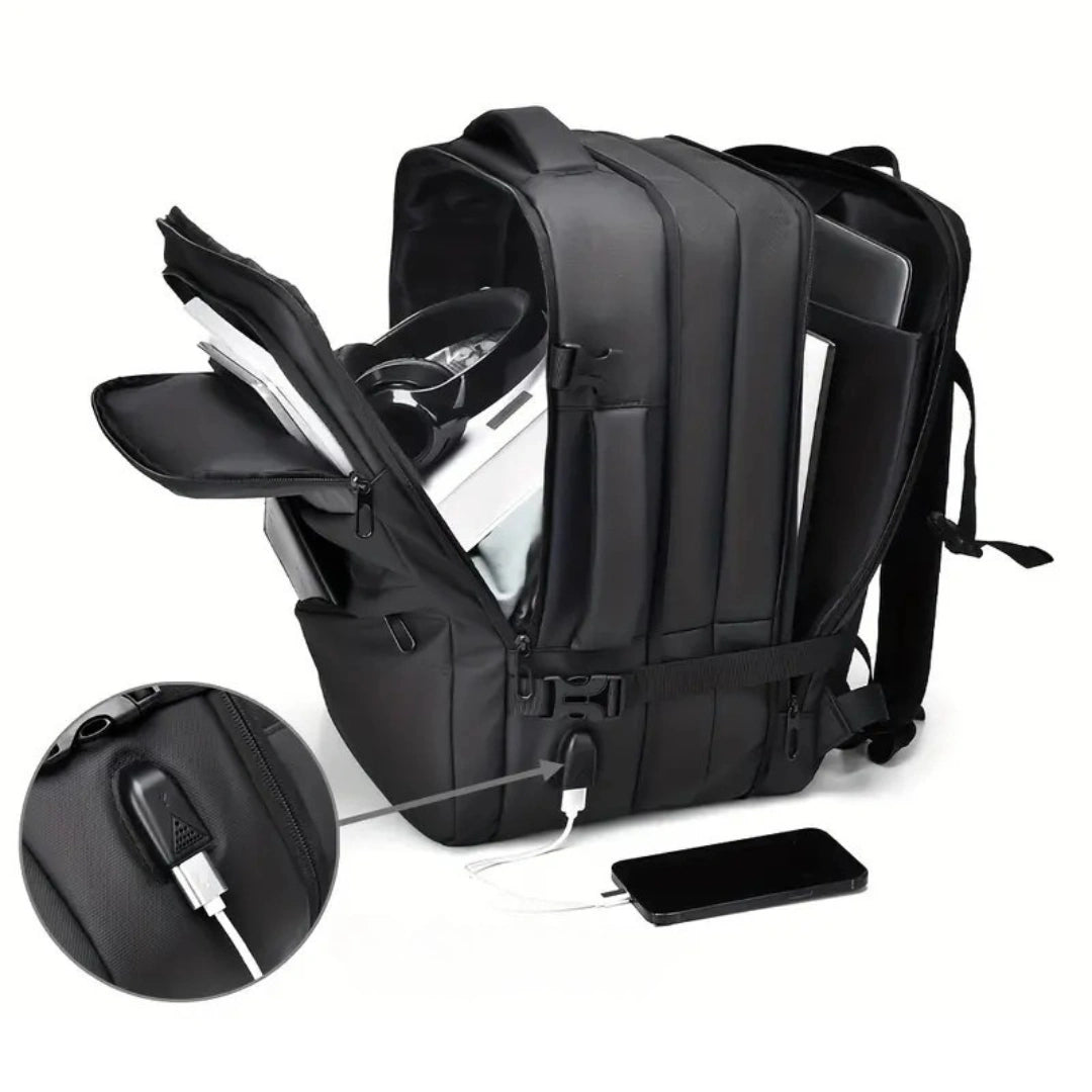 Packdemo: UrbanDay Rucksack aufgeklappt mit Kopfhörer, Kabel und Kleidung