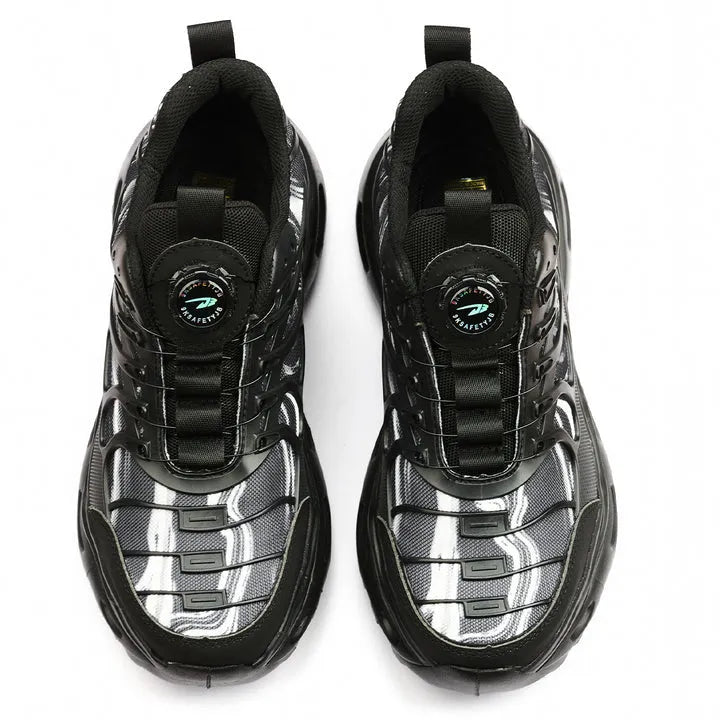 Paar Schuhe Draufsicht – gepolsterte Zunge, weite Zehenbox und Stahlkappen