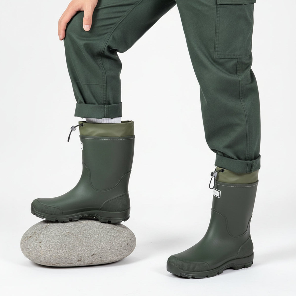 Henner Wassig Berufsschuhe Unisex in Grün – Fuß auf Stein