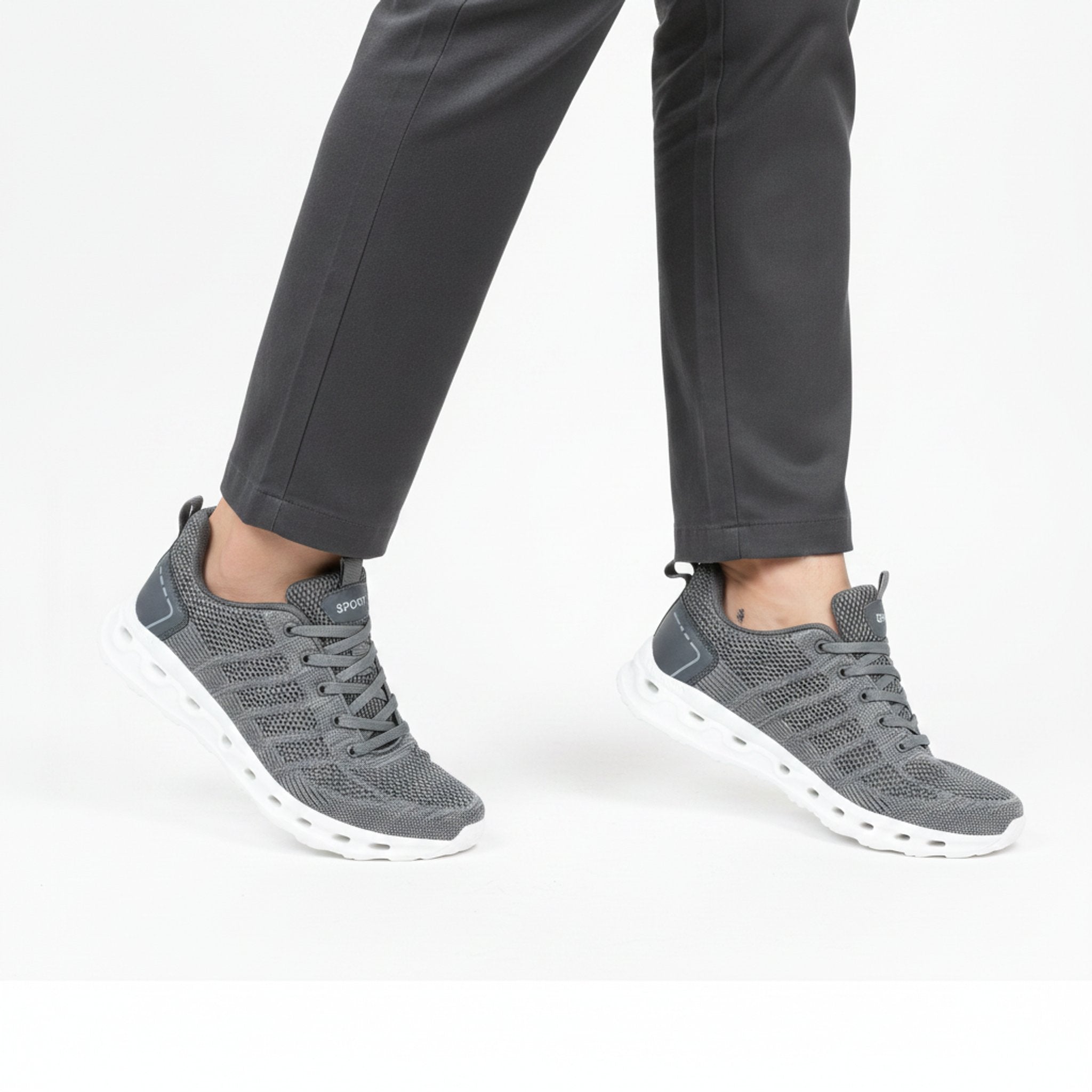 Henner OrthoTrek Berufsschuhe Unisex in Grau – seitliche Gehbewegung
