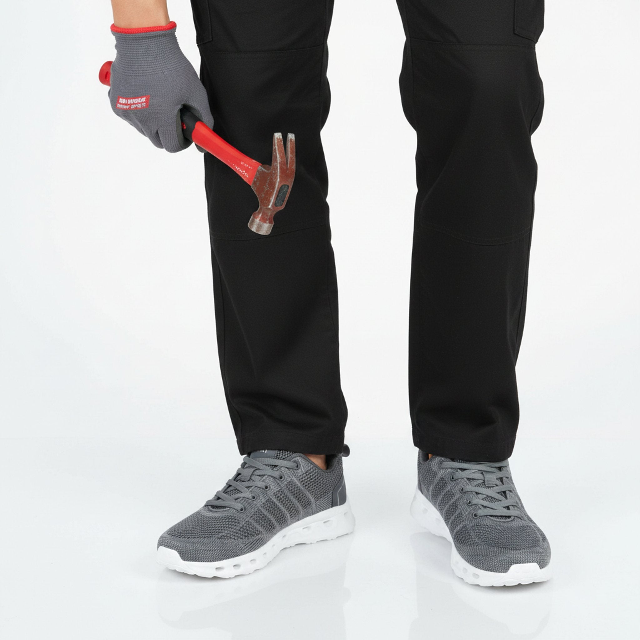 Henner OrthoTrek Berufsschuhe Unisex in Grau – Arbeitssituation mit Hammer