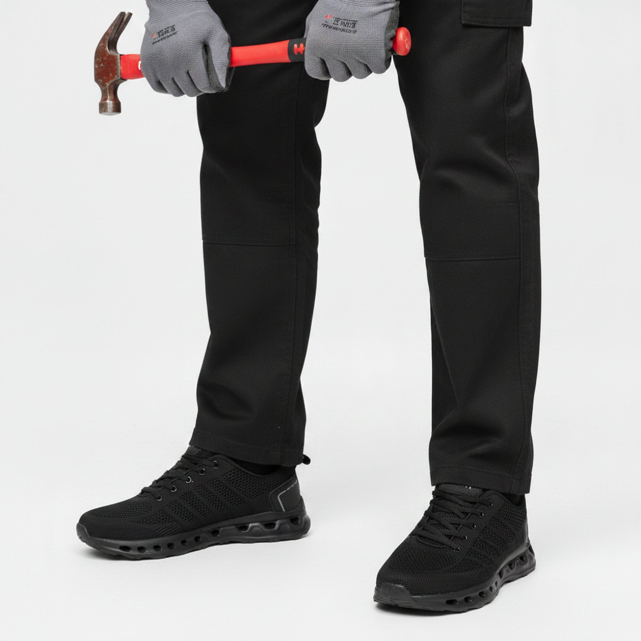 Henner OrthoTrek Berufsschuhe Unisex in Schwarz – Arbeitssituation mit Hammer