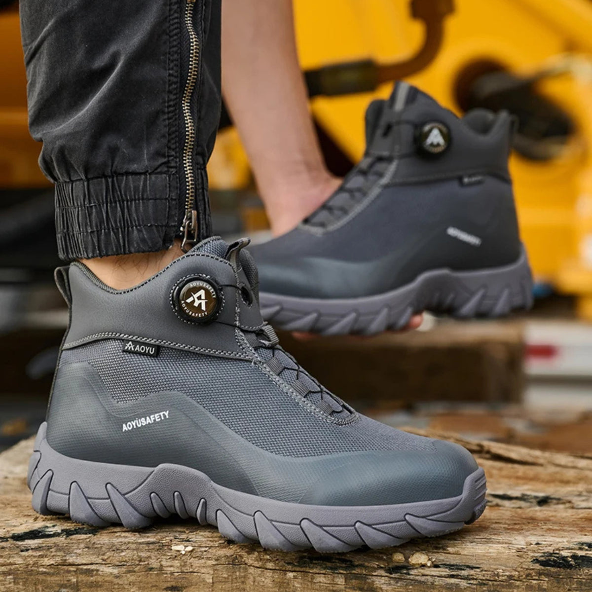 Henner Arot Sicherheitsstiefel mit Stahlkappe | Vierjahreszeiten & Warmfutter | Rutschfest Sicherheitsschuhe S3 Unisex in Grau – Dreiviertelansicht